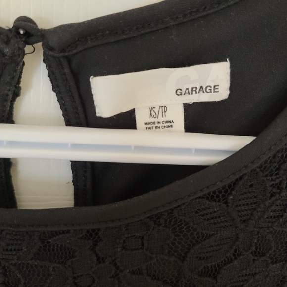 Garage Sleeveless Lace Peplum Top. Black. XS. - Picture 3 of 3